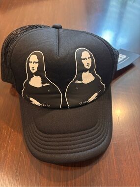 PLEASURES Black Trucker Hat with Double Mona Lisa Graphic - Men Accessories Hats